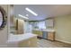 Well-lit kitchen featuring modern appliances, spacious countertops, and ample storage at 67 S Amulet Ave, Mesa, AZ 85208