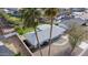Aerial view of a well-maintained home with desert landscaping and mature palm trees at 7041 E Cypress St St, Scottsdale, AZ 85257