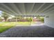 Covered patio with brickwork and lush green backyard for outdoor living and entertaining at 7041 E Cypress St St, Scottsdale, AZ 85257