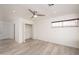 Spacious bedroom with ceiling fan, window, and closet offers ample room for relaxation at 7041 E Cypress St St, Scottsdale, AZ 85257