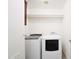 Dedicated laundry room features a modern washer and dryer set for convenience at 7041 E Cypress St St, Scottsdale, AZ 85257
