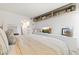 Bright bedroom features a stylish decor, sleek white furniture, and built-in shelving for a modern, organized aesthetic at 7350 N Via Paseo Del Sur -- # P107, Scottsdale, AZ 85258