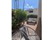 Private brick patio with lush landscaping and comfortable seating area at 7350 N Via Paseo Del Sur -- # P107, Scottsdale, AZ 85258