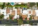 Aerial view showcasing the architecture and landscaping of an upscale neighborhood with a variety of red-tiled roofs at 7500 E Mccormick Pkwy # 73, Scottsdale, AZ 85258