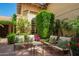 Relaxing courtyard featuring stylish seating, vibrant greenery, and a peaceful ambiance at 7500 E Mccormick Pkwy # 73, Scottsdale, AZ 85258