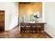 Spacious kitchen area with tile floors, counter seating, and stainless steel appliances at 7500 E Mccormick Pkwy # 73, Scottsdale, AZ 85258