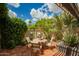Charming patio with dining set and lush landscaping, perfect for outdoor relaxation at 7500 E Mccormick Pkwy # 73, Scottsdale, AZ 85258