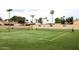 Outdoor tennis court ready for a game with friends on this well-kept green court at 7500 E Mccormick Pkwy # 73, Scottsdale, AZ 85258