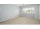 This carpeted bedroom features a window with blinds providing natural light at 7827 E Parkview Dr, Mesa, AZ 85208