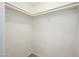 Walk-in closet space with rods for organized storage at 7827 E Parkview Dr, Mesa, AZ 85208