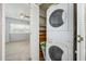 A space-saving laundry setup features a stacked washer and dryer at 7827 E Parkview Dr, Mesa, AZ 85208