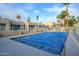 Outdoor community pool with a cover and patio area at 7827 E Parkview Dr, Mesa, AZ 85208