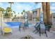 Community pool area with covered pool and lounge chairs for residents at 7827 E Parkview Dr, Mesa, AZ 85208
