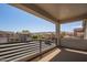This balcony provides a perfect place to unwind with panoramic views of the surrounding neighborhood and distant mountains at 8026 S 6Th Dr, Phoenix, AZ 85041