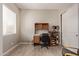 Bright room featuring modern light fixture, ample natural light and closet with sliding doors at 8026 S 6Th Dr, Phoenix, AZ 85041
