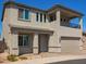 Charming two-story home with a two-car garage and balcony on the second floor, located in a sunny area at 8026 S 6Th Dr, Phoenix, AZ 85041