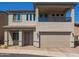 Charming two-story home with a two-car garage and balcony on the second floor, located in a sunny area at 8026 S 6Th Dr, Phoenix, AZ 85041
