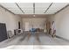 Spacious garage featuring ample storage, clean floor, and modern lighting, ideal for parking and projects at 8026 S 6Th Dr, Phoenix, AZ 85041