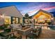 Backyard with outdoor seating, fire pit, and a pool, great for entertaining at 8220 E Sharon Dr, Scottsdale, AZ 85260