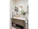 Stylish bathroom with a modern vanity, unique mirror and pendant lighting at 8220 E Sharon Dr, Scottsdale, AZ 85260