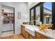 Convenient kitchenette with stainless steel sink, wooden cabinetry, and modern countertops at 8220 E Sharon Dr, Scottsdale, AZ 85260