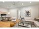 Cozy living area features a sectional sofa, hardwood floors, and contemporary decor at 8220 E Sharon Dr, Scottsdale, AZ 85260