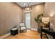 Sitting room featuring natural lighting, hard wood floors, and simple decor at 8220 E Sharon Dr, Scottsdale, AZ 85260