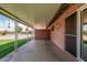 This covered patio provides plenty of room for relaxing or entertaining outdoors at 9816 N 95Th Dr # A, Peoria, AZ 85345