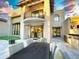Beautiful home exterior with balcony, backyard patio, dining and grilling area at 10113 E Topaz Dr, Scottsdale, AZ 85258
