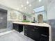 Elegant bathroom featuring dual vanities, marble countertops, large mirrors and modern fixtures, offering a spa-like retreat at 10113 E Topaz Dr, Scottsdale, AZ 85258