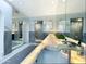 Bright bathroom with marble countertop, stylish cabinets, and a view into an adjoining vanity area at 10113 E Topaz Dr, Scottsdale, AZ 85258
