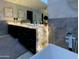 Modern bathroom featuring a double vanity with illuminated countertop, sleek cabinets, and a soaking tub at 10113 E Topaz Dr, Scottsdale, AZ 85258