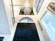 Elegant foyer features high ceilings, statement chandelier, and grand double doors at 10113 E Topaz Dr, Scottsdale, AZ 85258