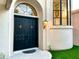 Elegant entryway featuring double doors, arched window, and a well-lit, inviting entrance at 10113 E Topaz Dr, Scottsdale, AZ 85258