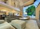 Spacious living room with large windows, modern decor, and an open-concept design at 10113 E Topaz Dr, Scottsdale, AZ 85258