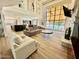 Bright and open living room with high ceilings, a large window, and views of the pool at 10113 E Topaz Dr, Scottsdale, AZ 85258