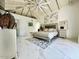 Large main bedroom with vaulted ceilings, tiled floors, and elegant decor at 10113 E Topaz Dr, Scottsdale, AZ 85258