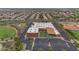 Aerial view of a school with a parking lot and athletic field in a suburban neighborhood at 10425 E Corbin Ave, Mesa, AZ 85212
