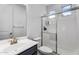 Bathroom featuring a vanity, toilet, and glass enclosed shower at 10425 E Corbin Ave, Mesa, AZ 85212