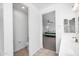Bright bathroom with tile floor, a toilet room and view to main bedroom at 10425 E Corbin Ave, Mesa, AZ 85212