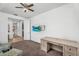 Spare bedroom with TV, ceiling fan and a desk at 10425 E Corbin Ave, Mesa, AZ 85212