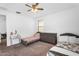 Spacious bedroom featuring two beds, dresser and makeup table at 10425 E Corbin Ave, Mesa, AZ 85212