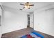 Well-lit bedroom includes a closet and entrance to the bathroom at 10425 E Corbin Ave, Mesa, AZ 85212