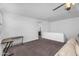 Second floor living area with a sofa and desk at 10425 E Corbin Ave, Mesa, AZ 85212