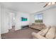 Spacious living room with comfortable seating and large windows for natural light at 10425 E Corbin Ave, Mesa, AZ 85212