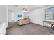 Second floor living area with a sofa and a desk with views at 10425 E Corbin Ave, Mesa, AZ 85212