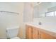 Functional bathroom with a vanity, toilet, and classic fixtures, ready for customization at 1059 E 9Th Ave, Mesa, AZ 85204