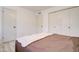 Comfortable bedroom featuring a bed with a decorative quilt and ample closet space for storage at 1059 E 9Th Ave, Mesa, AZ 85204