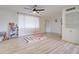Airy living area with sleek flooring, built-in storage, and an abundance of natural light at 1059 E 9Th Ave, Mesa, AZ 85204