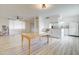 Open living space with a dining area flowing into a kitchen, perfect for modern living and entertaining at 1059 E 9Th Ave, Mesa, AZ 85204